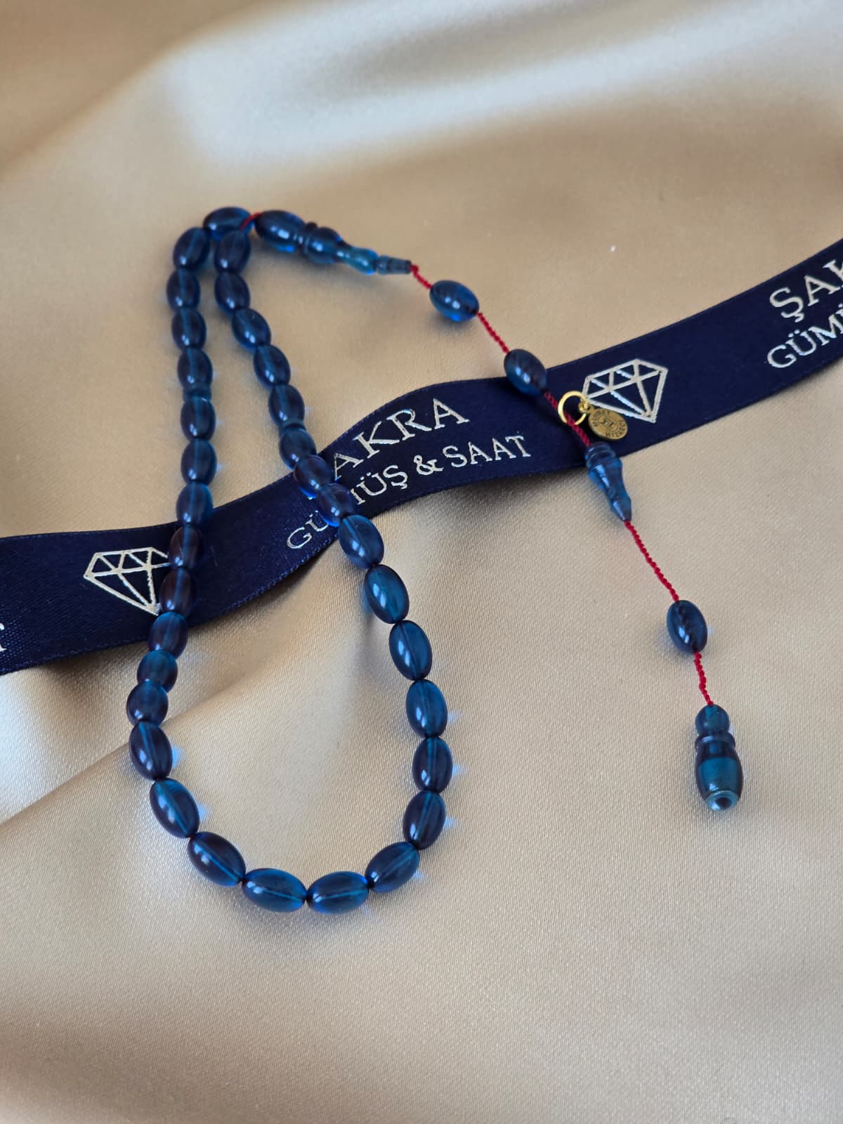 Lacivert Tonlu Şeffaf Sistemli Ateş Kehribar Tesbih